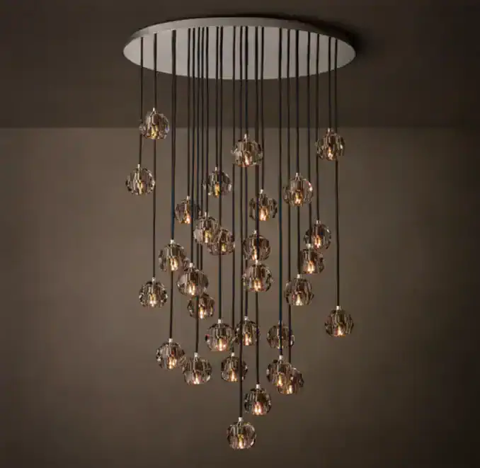 Elegant modern chandelier with crystal accents and multiple hanging lights.