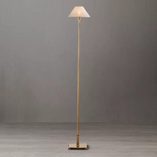 Elegant steel floor lamp with petite linen shade for modern interiors.