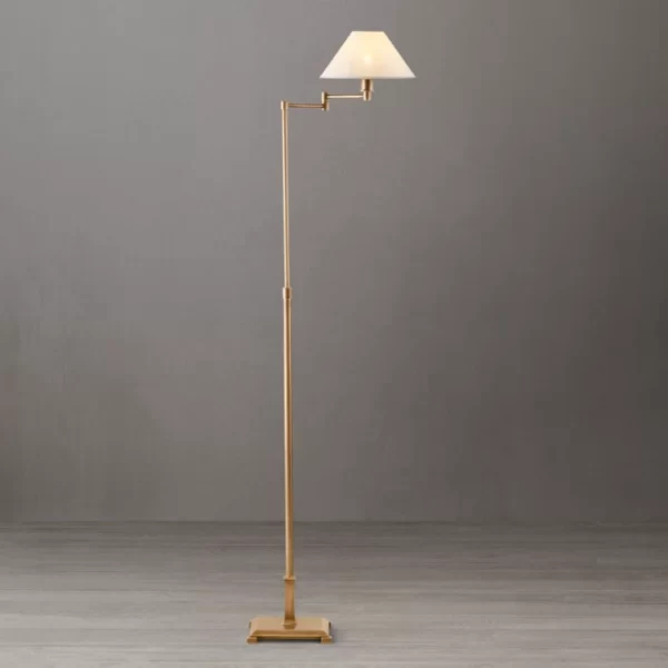 Elegant metal floor lamp with linen shade and adjustable swing arm.
