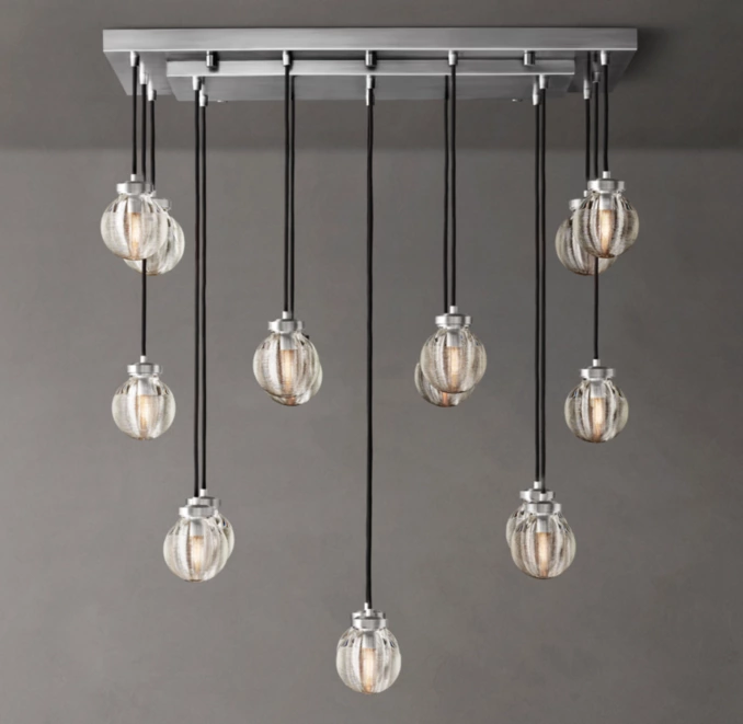 Contemporary pendant light with multiple glass globes for modern interior decor.