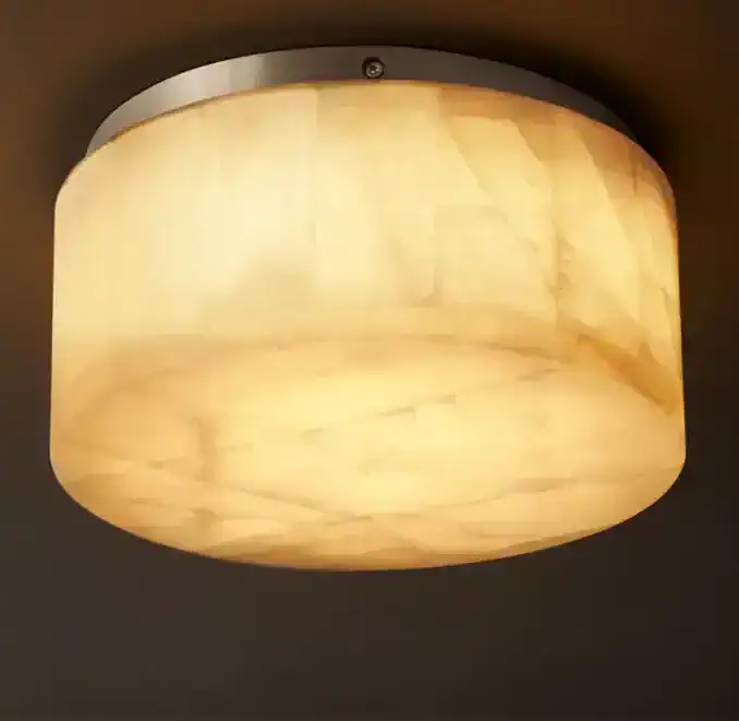 Gorvey GV Calcite Flushmount Round Light with warm glow.