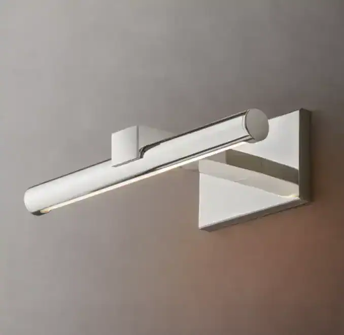 Gorvey GV Vela Round Brass Picture Light mounted on wall.