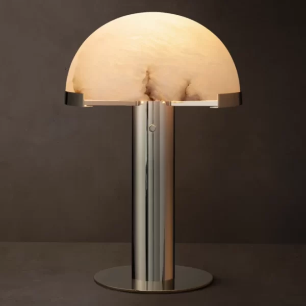 Modern table lamp with alabaster shade and brass base for elegant lighting.