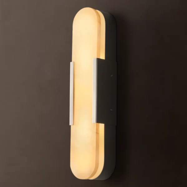 Modern alabaster sconce with brass accents for elegant lighting.