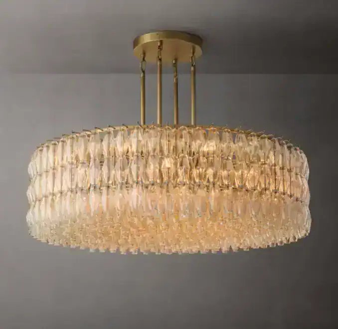 Elegant crystal chandelier with gold finish for luxurious lighting.
