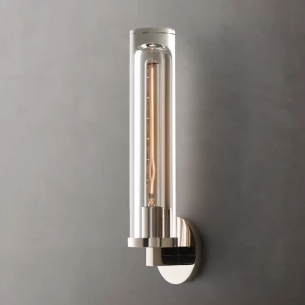 Modern wall sconce with glass and brass finish for elegant lighting.