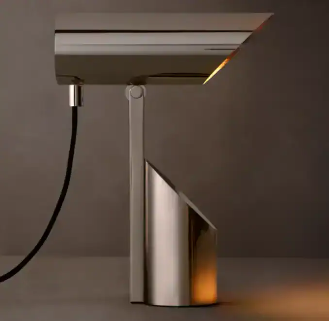 Modern brass spotlight folding table light for stylish illumination.