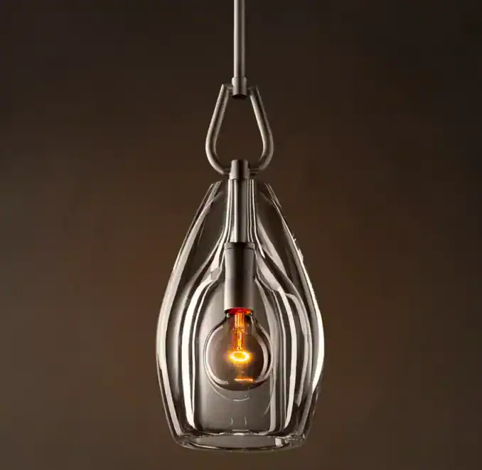 Modern Gorvey lighting pendant with glass and metal design.