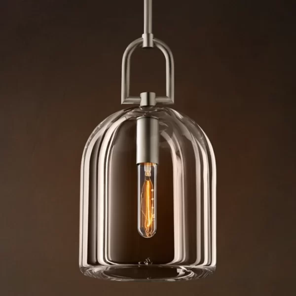 Gorvey Lighting glass cloche pendant with vintage filament bulb.