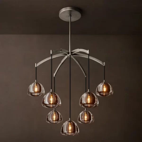Round chandelier with glass domes and warm lighting, modern ceiling fixture.