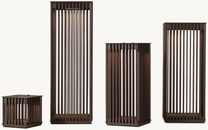 Set of four modern outdoor wooden lanterns in various sizes for garden lighting.