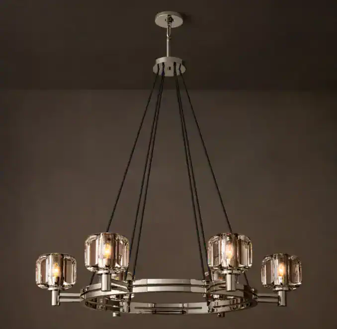 Elegant K9 glass chandelier with steel frame and six lights.