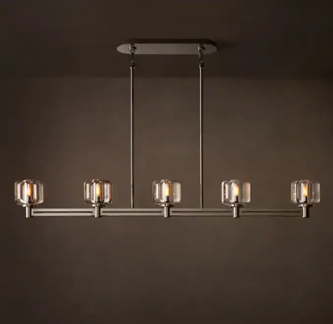 Modern linear chandelier with cast glass and steel design for elegant lighting.
