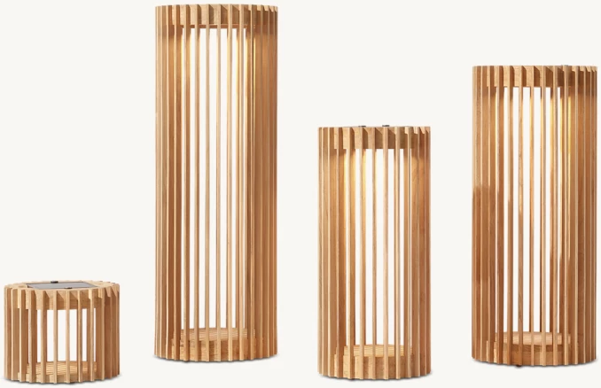 Set of four teak solar lanterns with vertical slats for outdoor lighting.