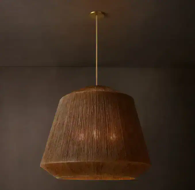 Wooden pendant lamp hanging from ceiling with warm lighting.