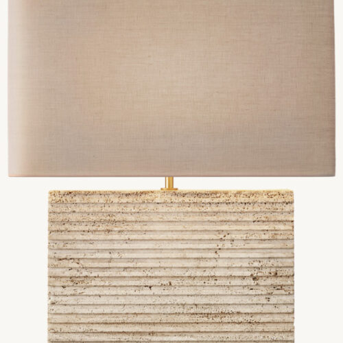 Modern travertine table lamp with rectangular base and fabric shade.