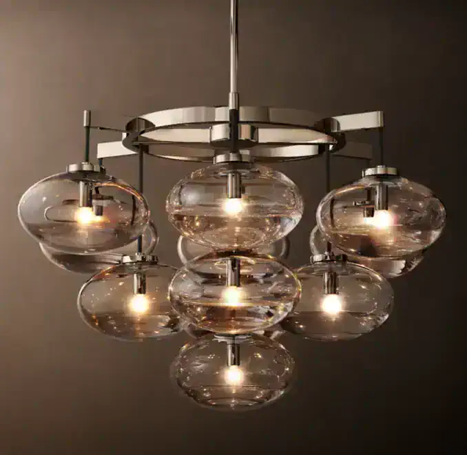 Elegant glass chandelier with multiple glass globes and modern design.