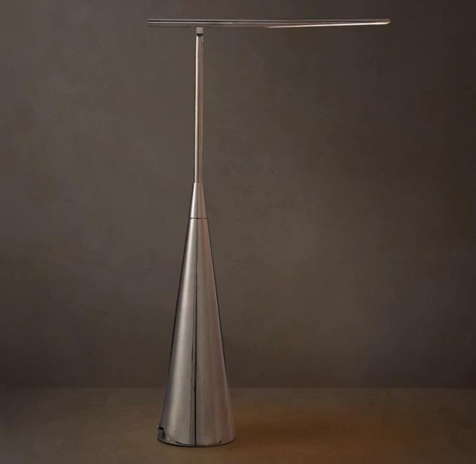 Modern adjustable LED floor lamp with sleek metallic finish.