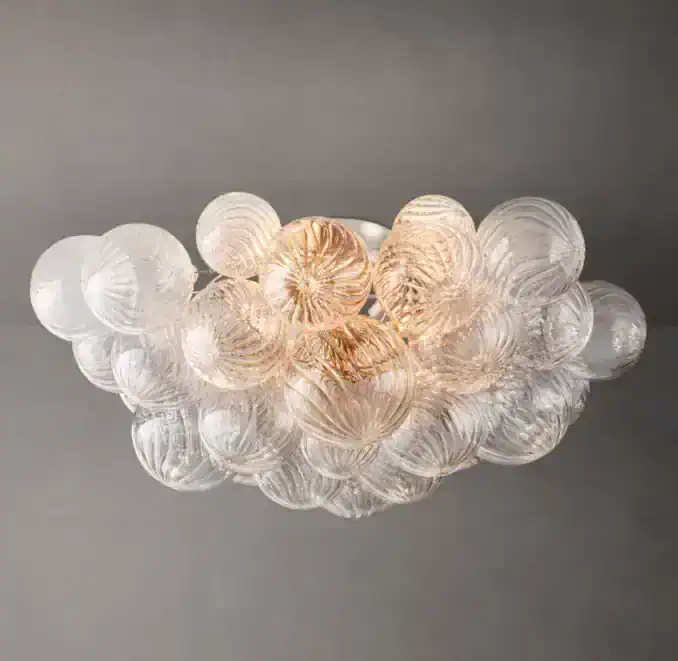 Elegant glass flushmount ceiling light with multiple spherical glass shades.