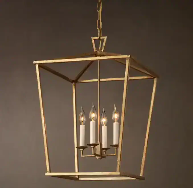 Gorvey Lighting openwork pendant with candle-style bulbs and gold finish.