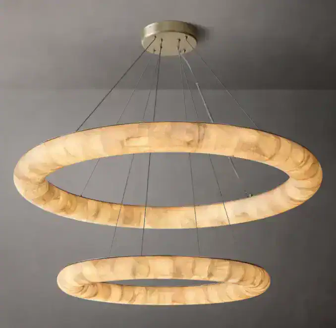 Elegant two-tier round chandelier with warm lighting for modern interiors.