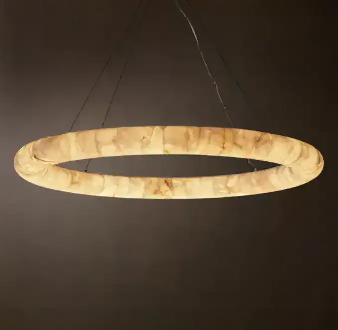 Elegant circular calcite chandelier from Gorvey Lighting for modern interiors.