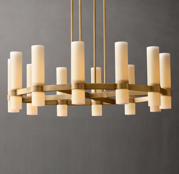 Elegant round chandelier with milk glass candle-like lights and gold accents.