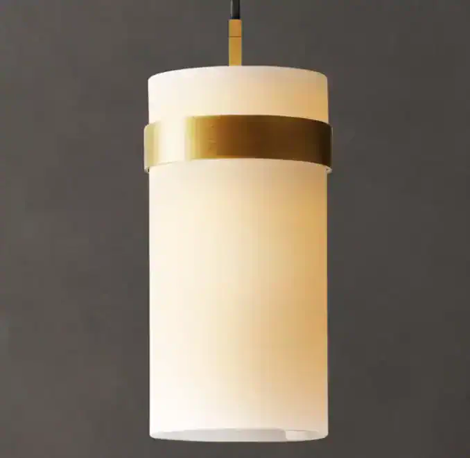 Modern pendant light with white shade and gold accent for stylish interiors.
