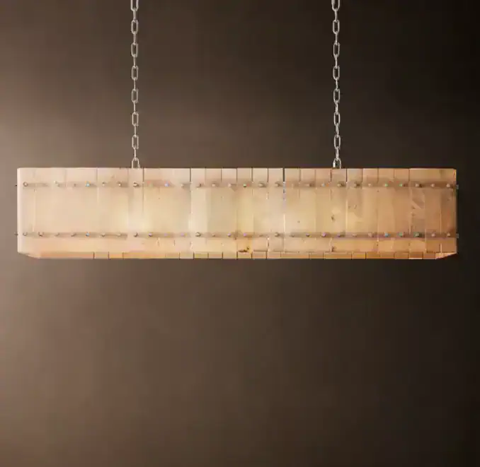 Elegant linear chandelier with alabaster finish for modern lighting design.