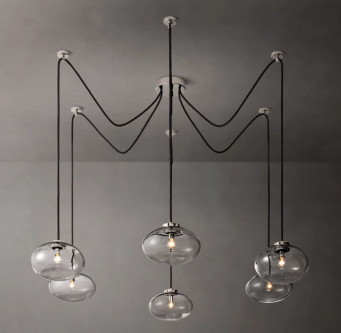 Modern glass chandelier with five hanging globes for elegant lighting.