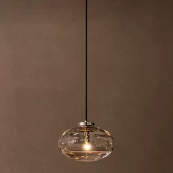 Gorvey glass pendant light hanging from ceiling with steel fixture.