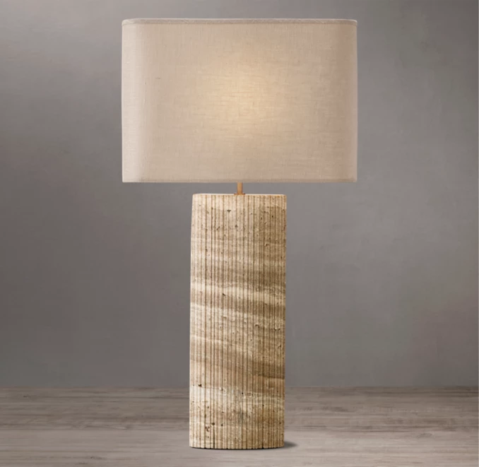 Gorvey stone lamp with Tiziano Travertine base and fabric shade.
