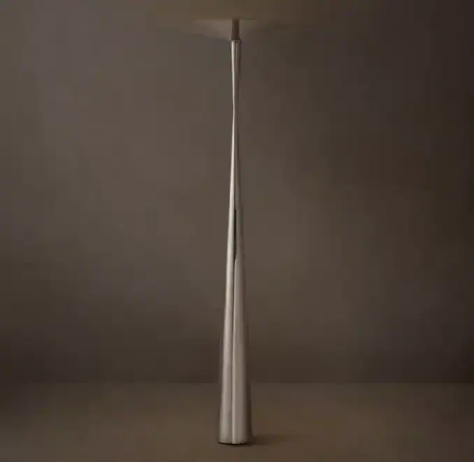 Modern steel torchiere lamp with sleek design for stylish lighting.