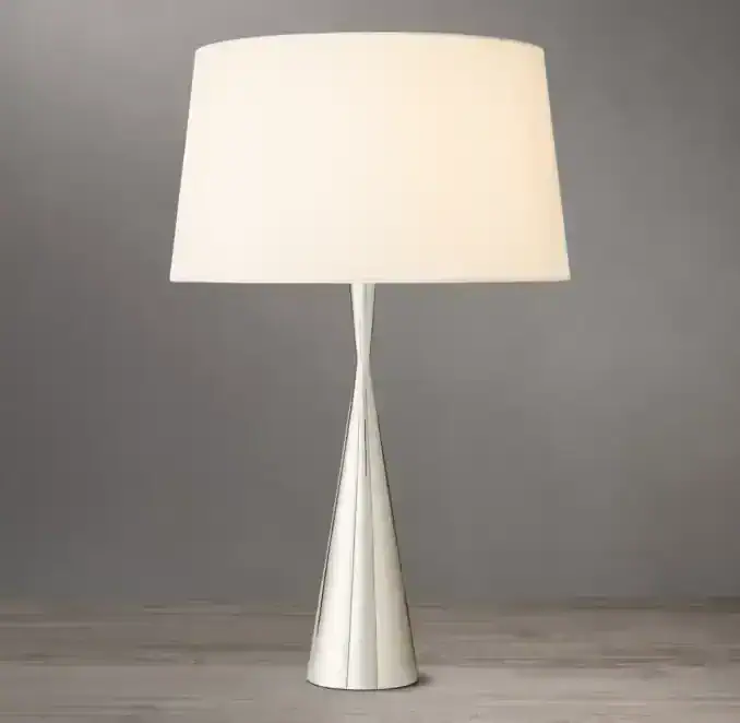 Modern steel lamp with slope linen shade for stylish lighting.