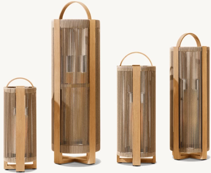 Set of four modern teak lanterns with removable glass hurricane for outdoor decor.