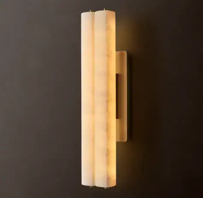 Double wall light sconce with alabaster finish for elegant lighting.