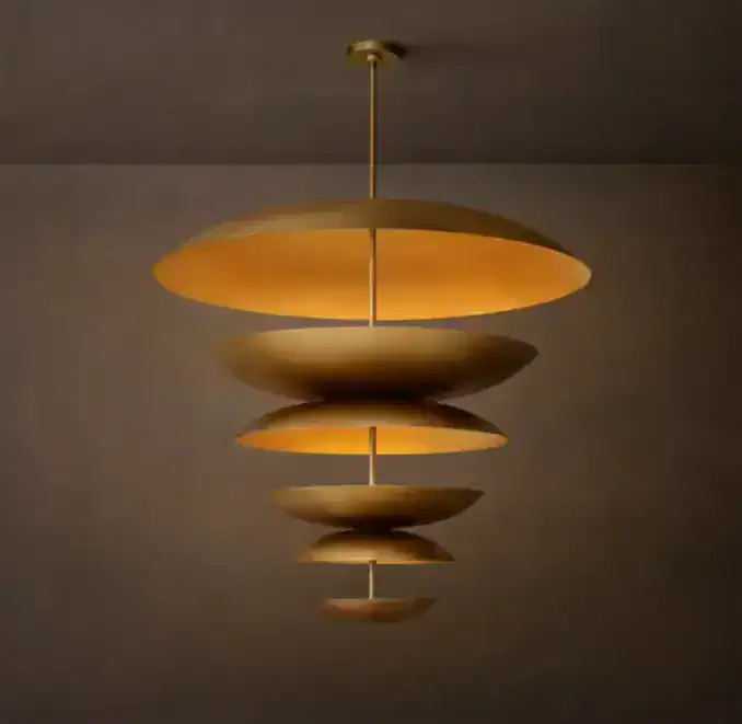 Elegant tiered chandelier with metallic discs for modern lighting design.
