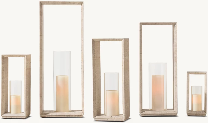 Set of modern wooden candle holders with candles inside for outdoor decor.