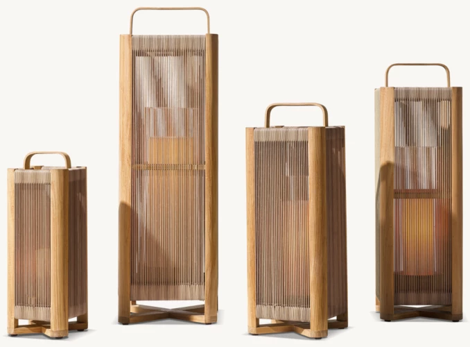 Set of four wooden lanterns for outdoor lighting and decor.