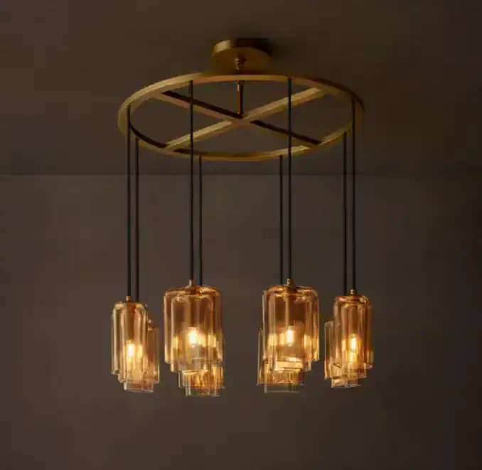 Amber glass pendant chandelier with five lights and modern design.