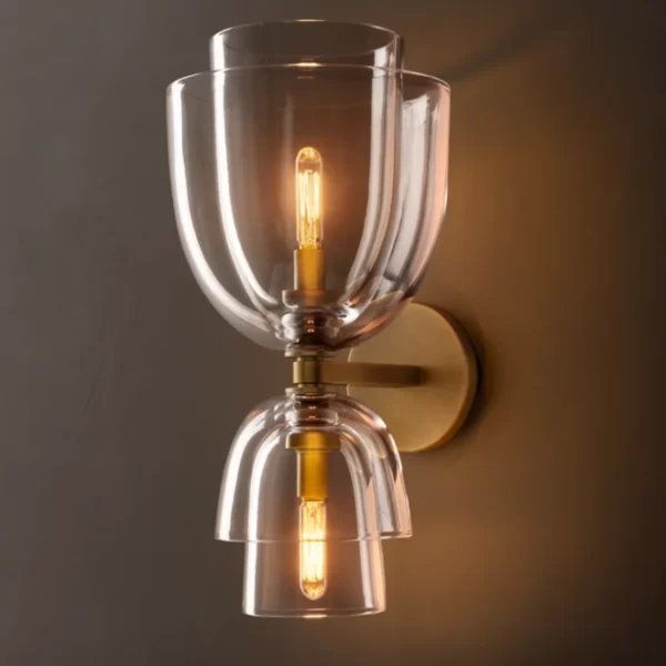 Elegant glass cloche sconce with warm lighting for modern decor.