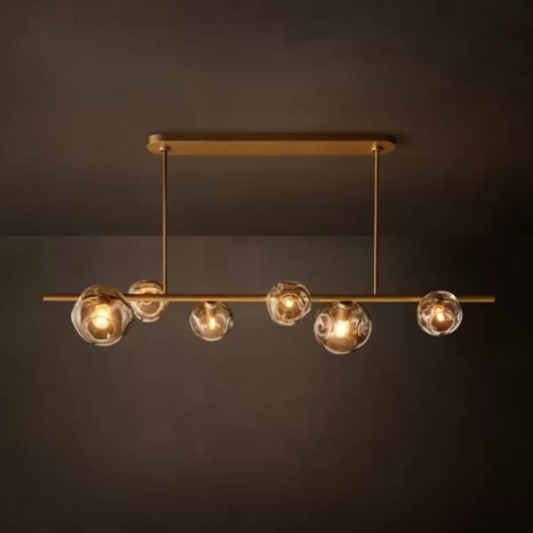 Modern bubble glass chandelier with gold finish for elegant lighting.