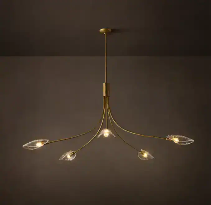 Modern chandelier with glass and gold finish for elegant lighting.