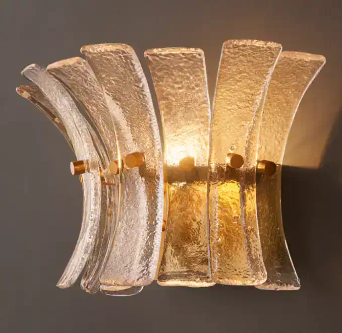 Modern glass sconce with gold accents from Gorvey Lighting.