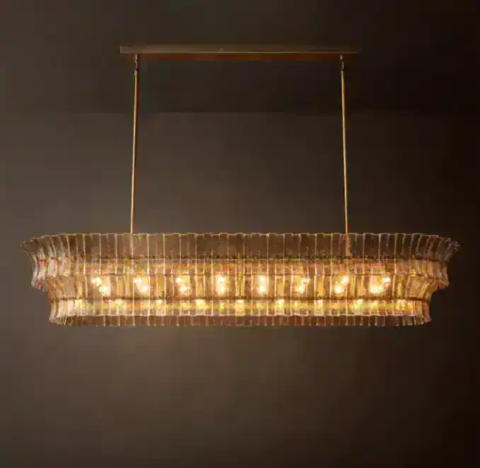 Gorvey linear chandelier with smoke glass and warm lighting.