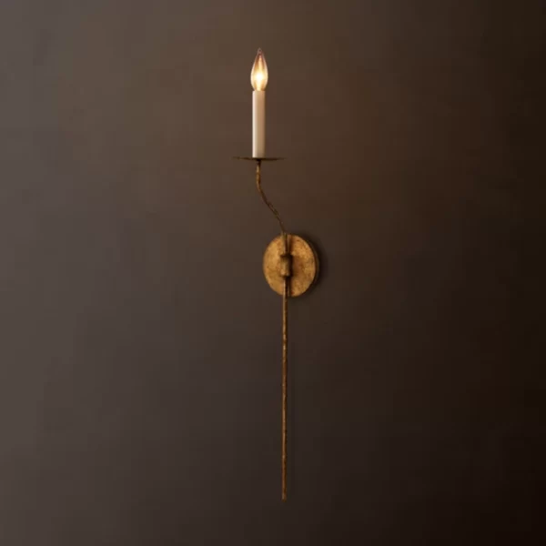 Elegant wall sconce with candle-style light and rustic finish.
