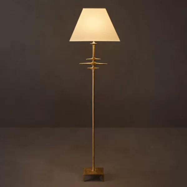 Modern metal floor lamp with linen shade for stylish lighting.