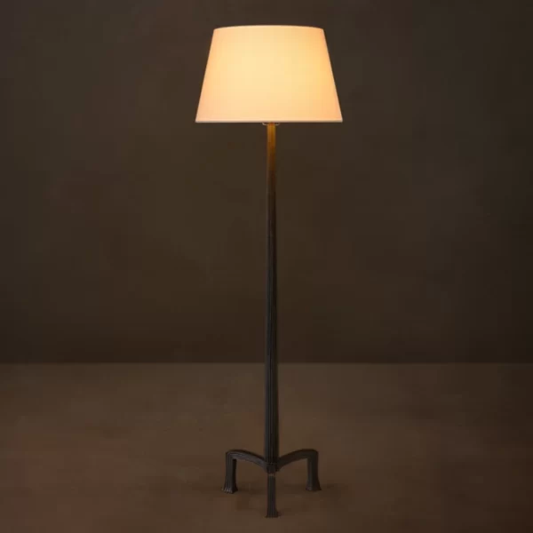 Modern ribbed metal floor lamp with linen shade for stylish lighting.