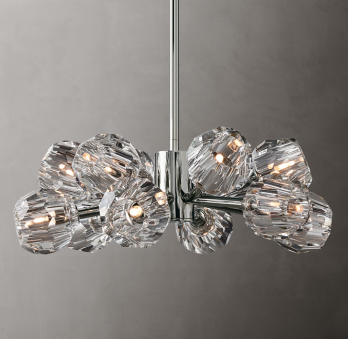 Elegant modern crystal chandelier with multiple glass shades and LED lights.