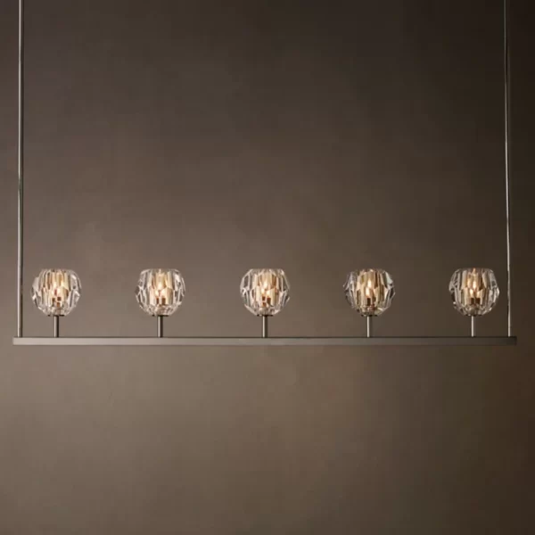 Elegant crystal glass linear chandelier with six spherical pendants.